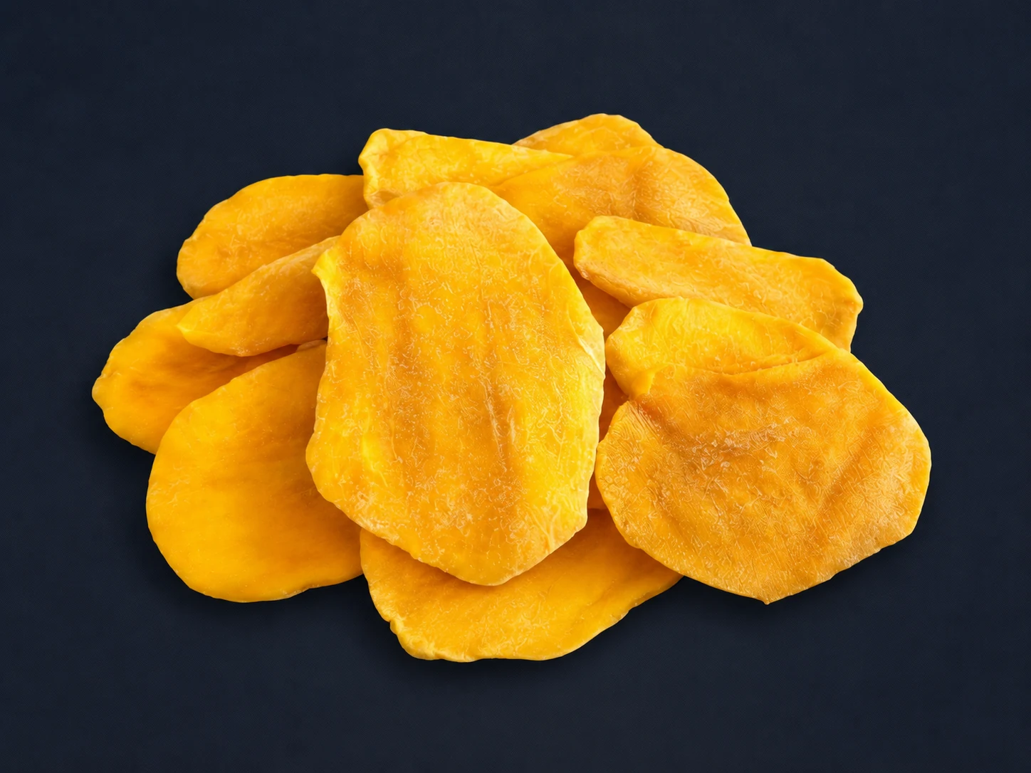 Dried mango slices on a dark background, Eurasian Bridge