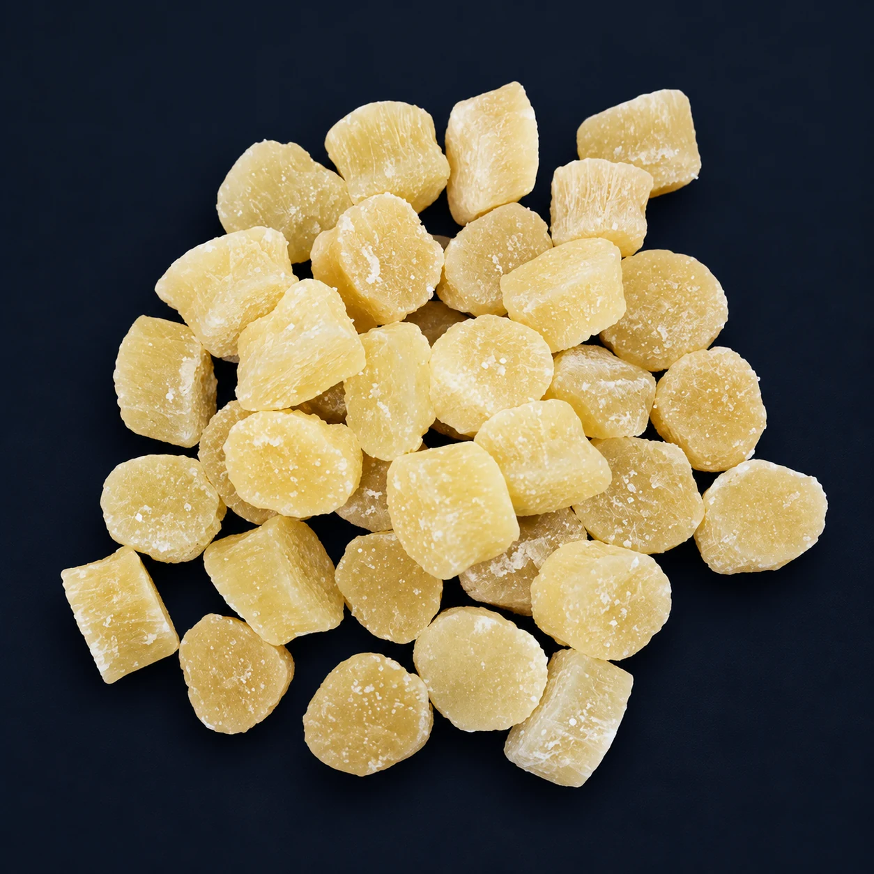 Dried pineapple core chunks on a dark background, Eurasian Bridge